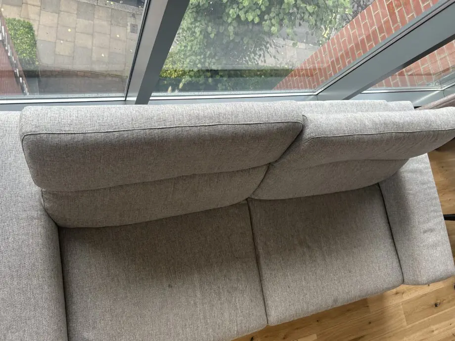 Natuzzi 2 Seater fabric grey sofa