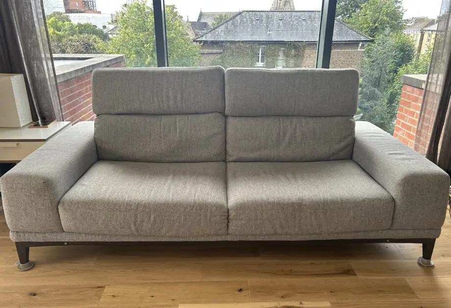 Natuzzi 2 Seater fabric grey sofa