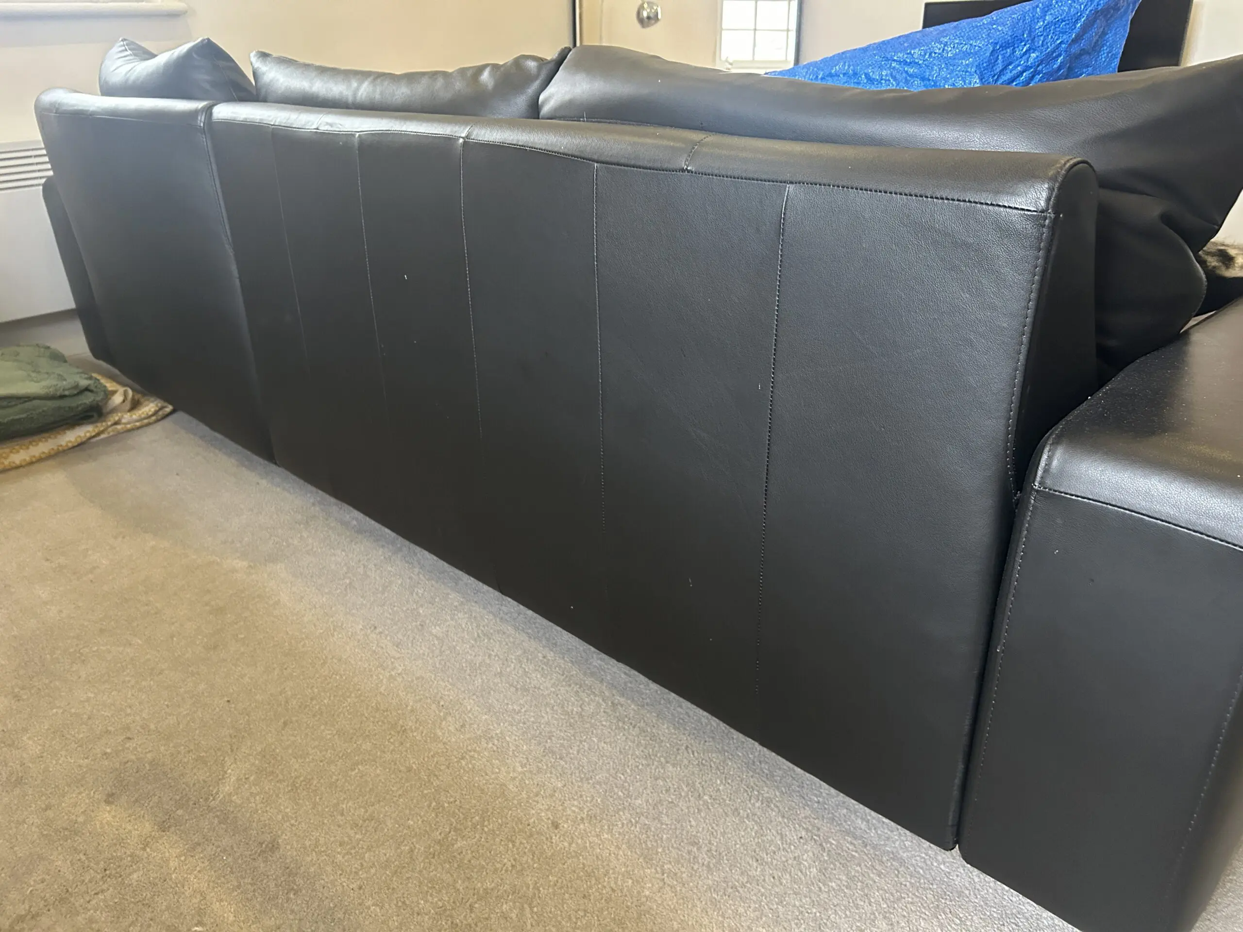 Black leather corner sofa