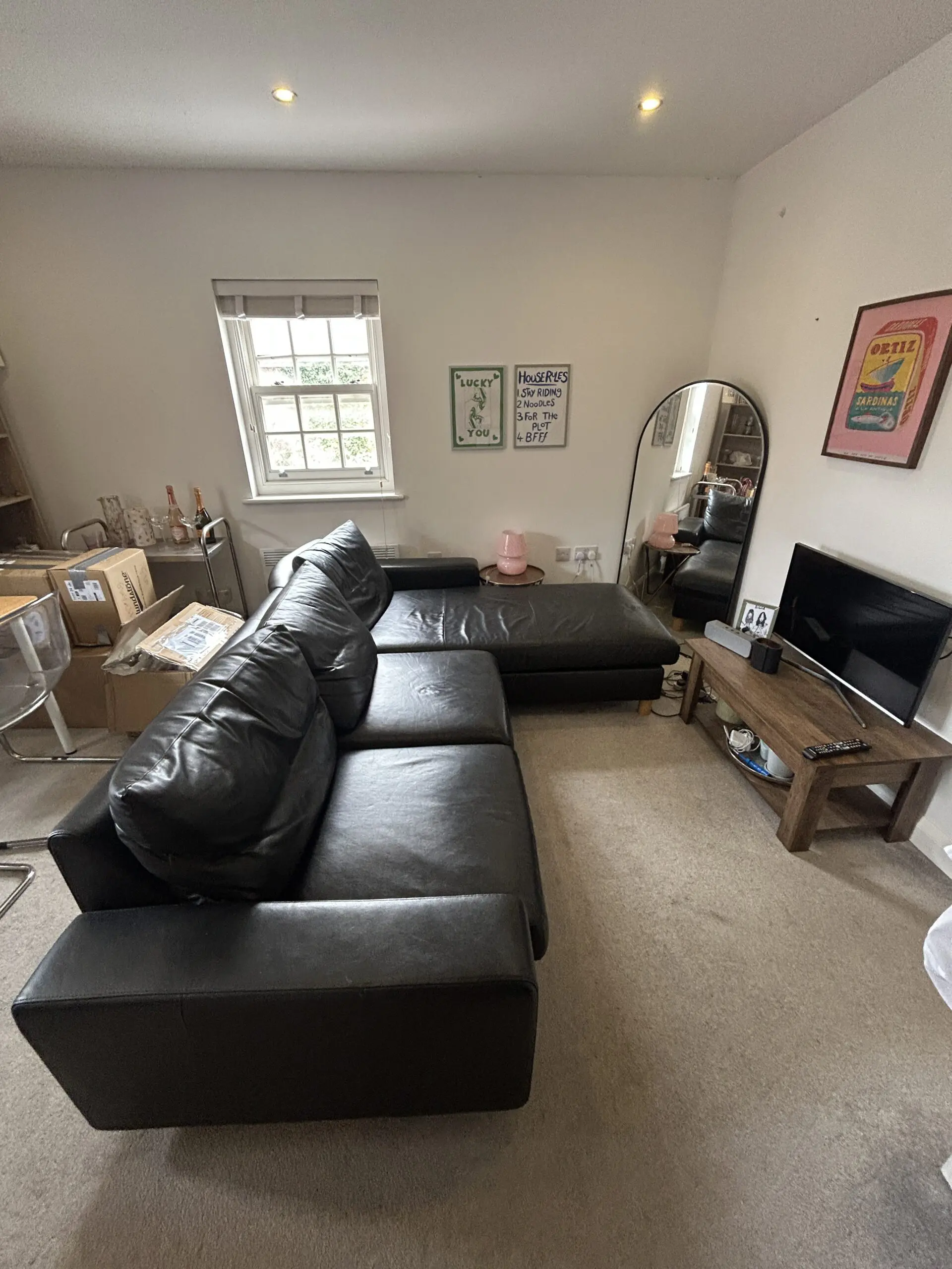 Black leather corner sofa