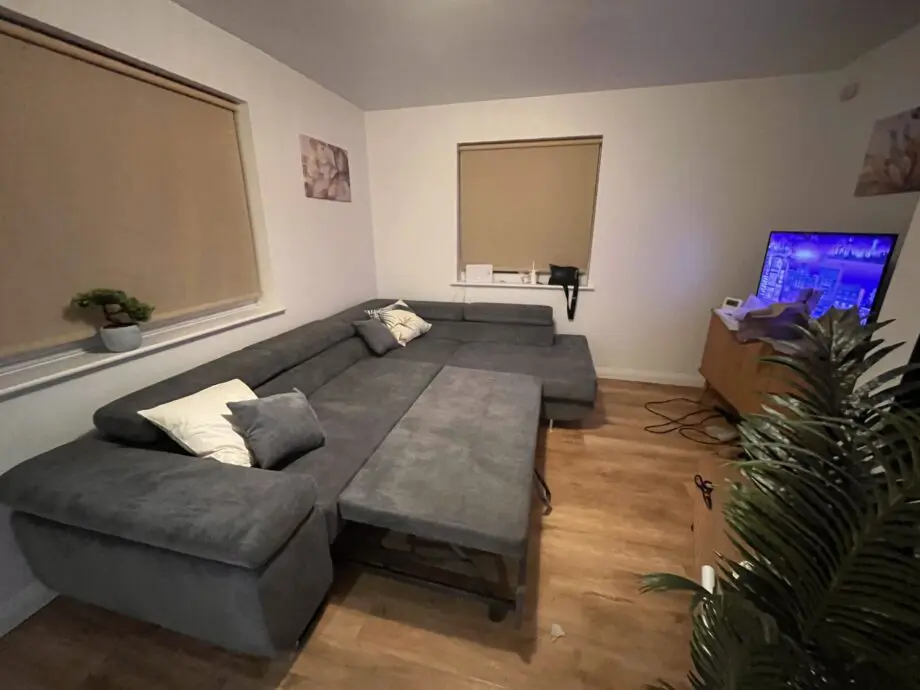 Grey corner with storage and double sofa bed