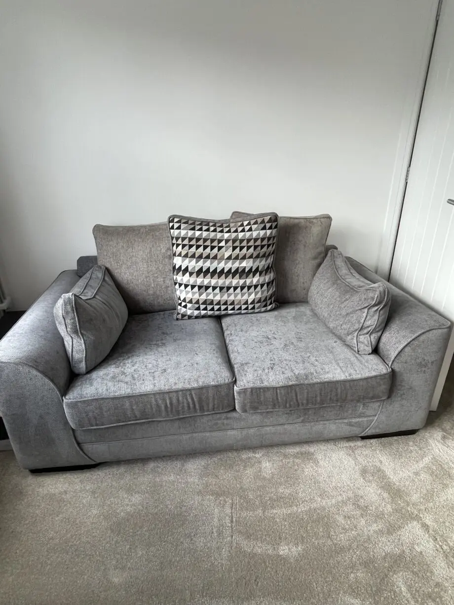 Scs grey sofas and footstools