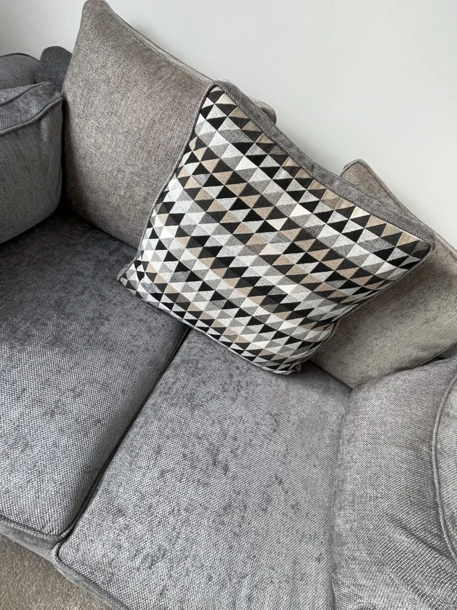 Scs grey sofas and footstools