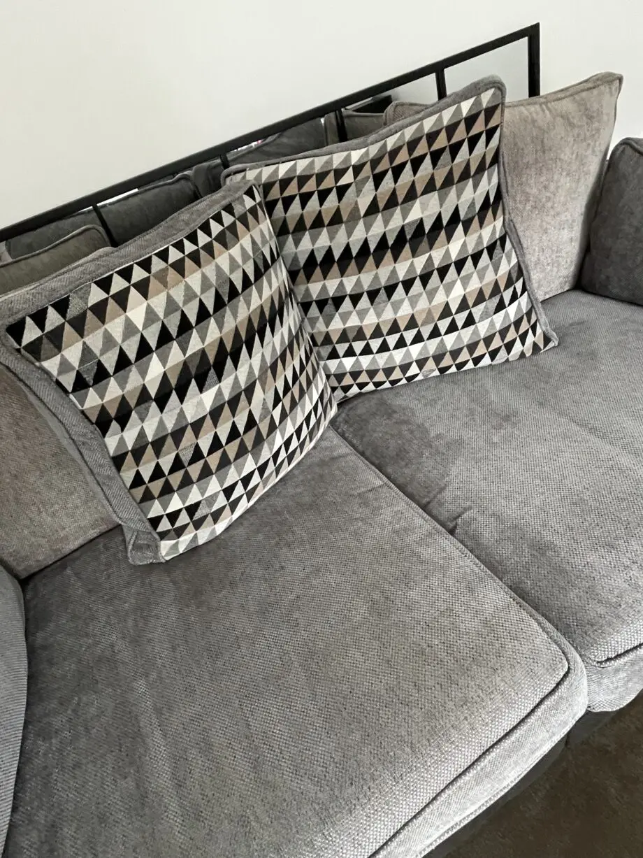 Scs grey sofas and footstools