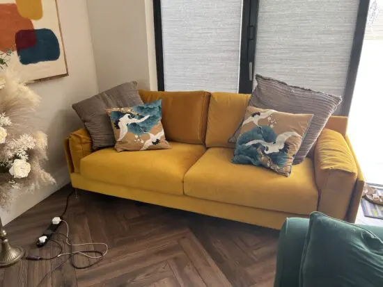 Extra large immaculate mustard 3 seater modern sofa. Hardly used as kept in spare room. Pet free and smoke free house