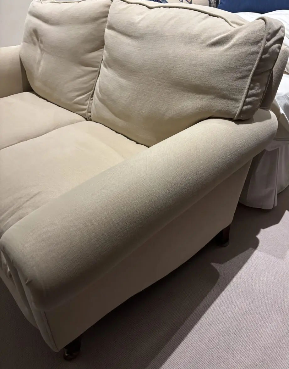 Highly Sprung cream/light beige 2 seater sofa