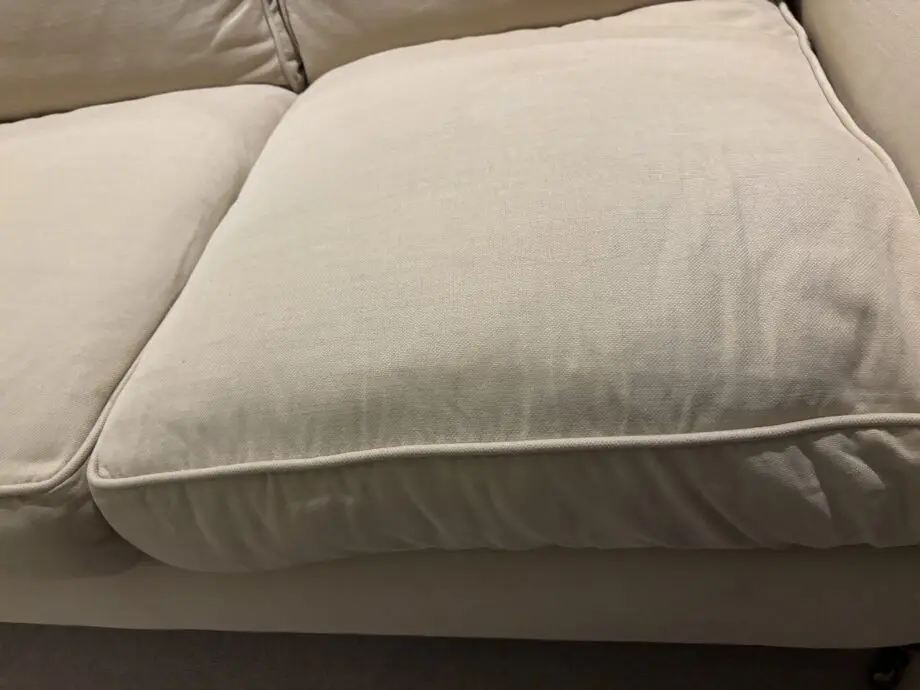 Highly Sprung cream/light beige 2 seater sofa