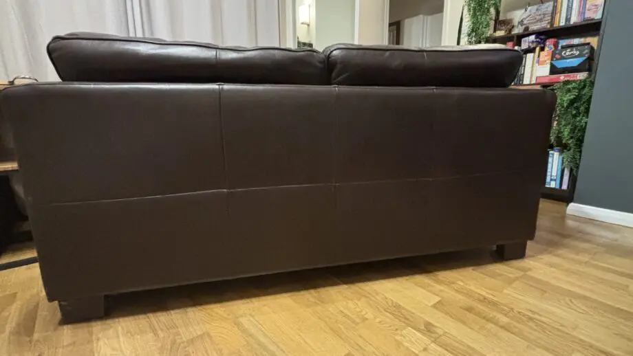 Twin brown real leather sofas