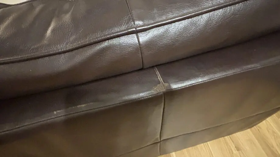 Twin brown real leather sofas