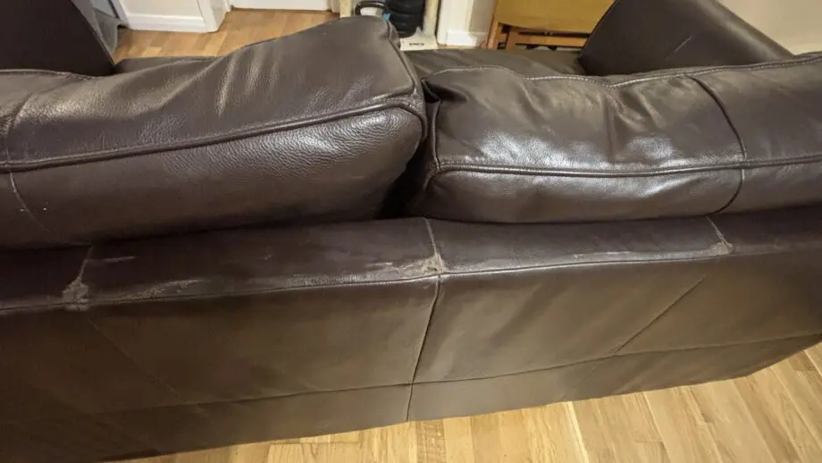 Twin brown real leather sofas