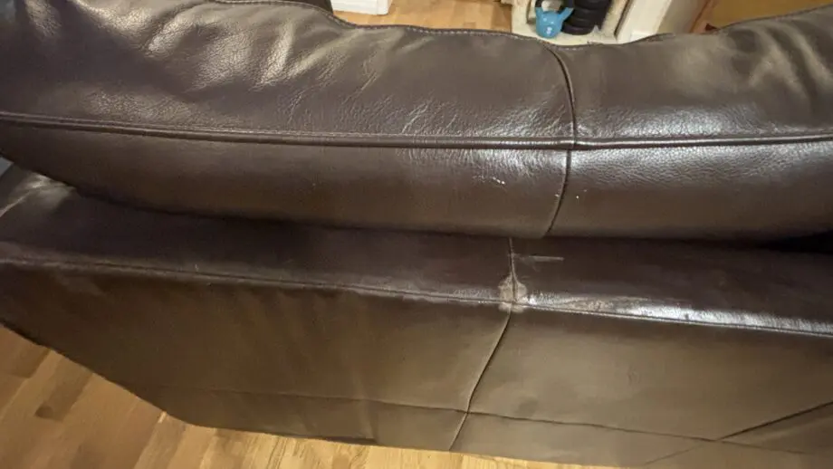 Twin brown real leather sofas