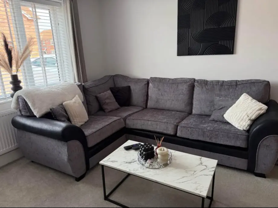 DFS corner sofa grey and black