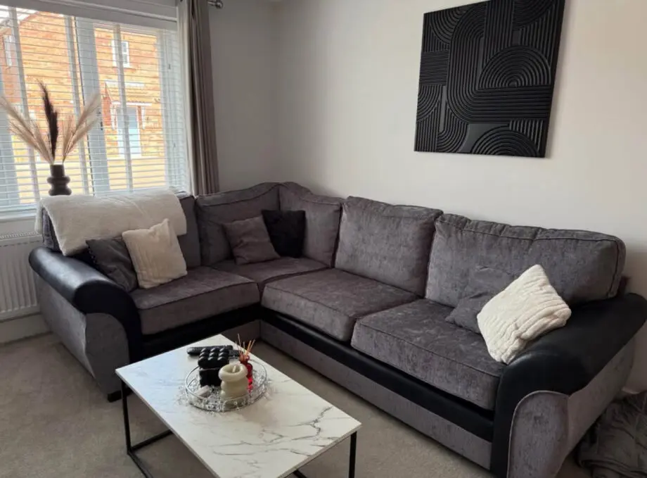DFS corner sofa grey and black