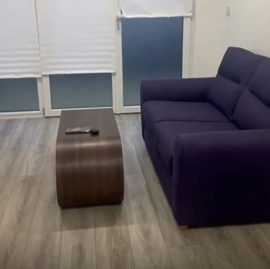 its a 2 seater beautiful sofa, purple in colour