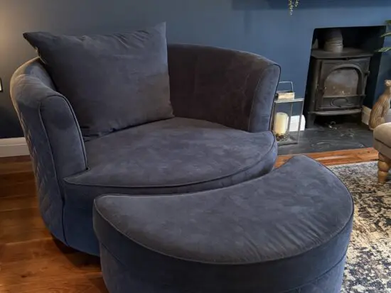 DFS Orka large swivel chair with footstool. 3 yrs insurance cover included