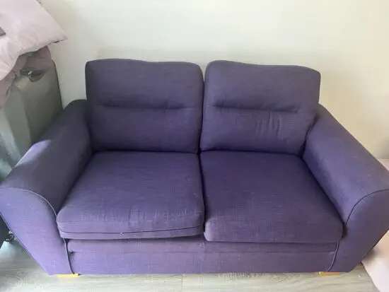its a 2 seater beautiful sofa, purple in colour