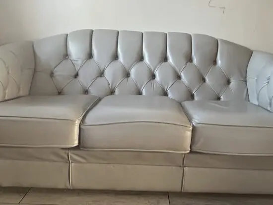 Leather chesterfield style sofa