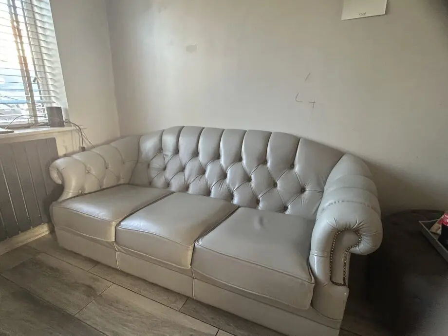 Leather chesterfield style sofa