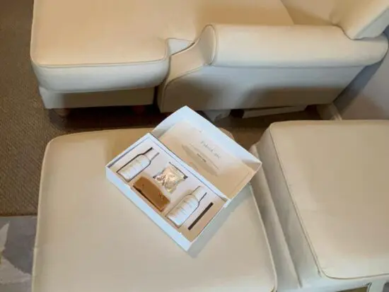 dfs sofas - 3 seater with 2 footstool storage - used