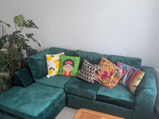 Brand new emerald green velvet L-shaped sofa (Left as facing)