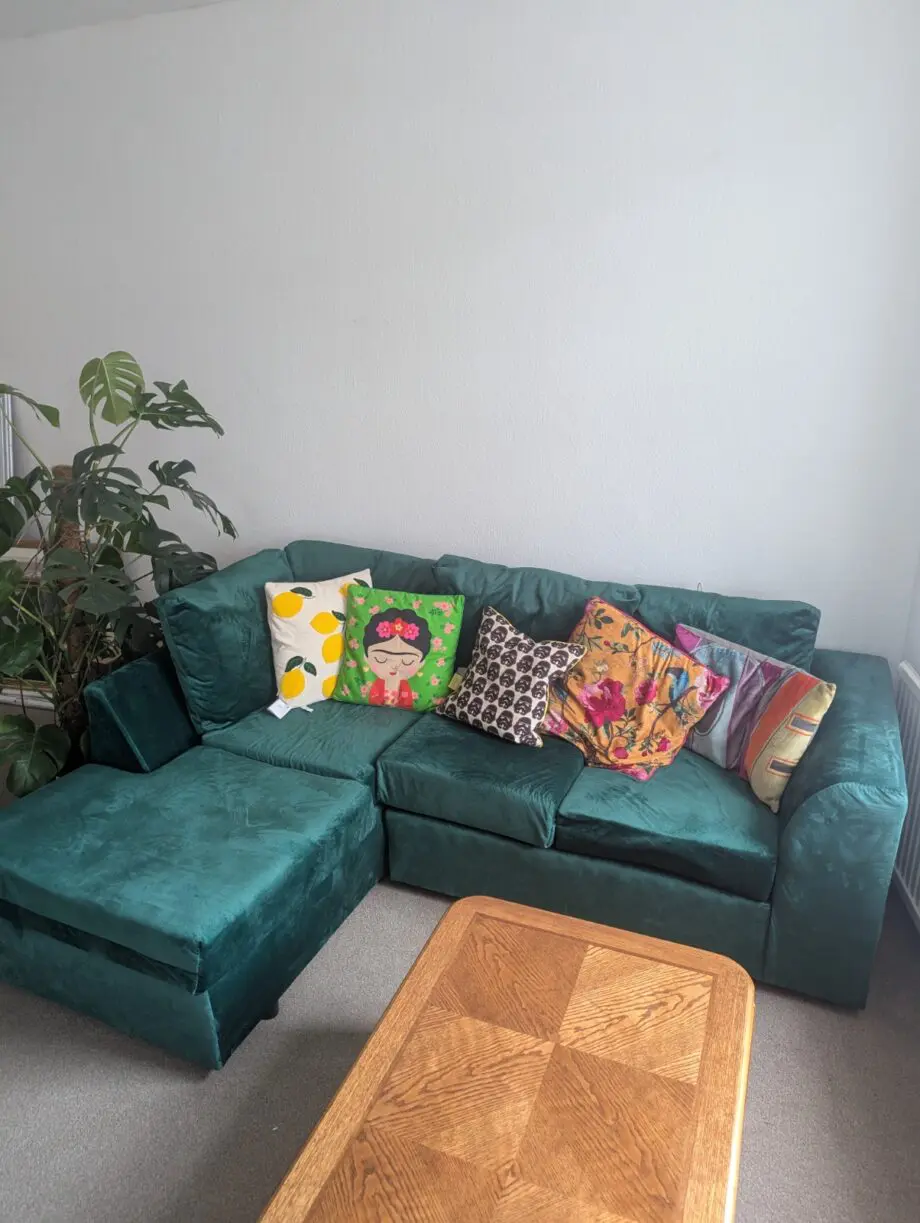 Brand new emerald green velvet L-shaped sofa (Left as facing)