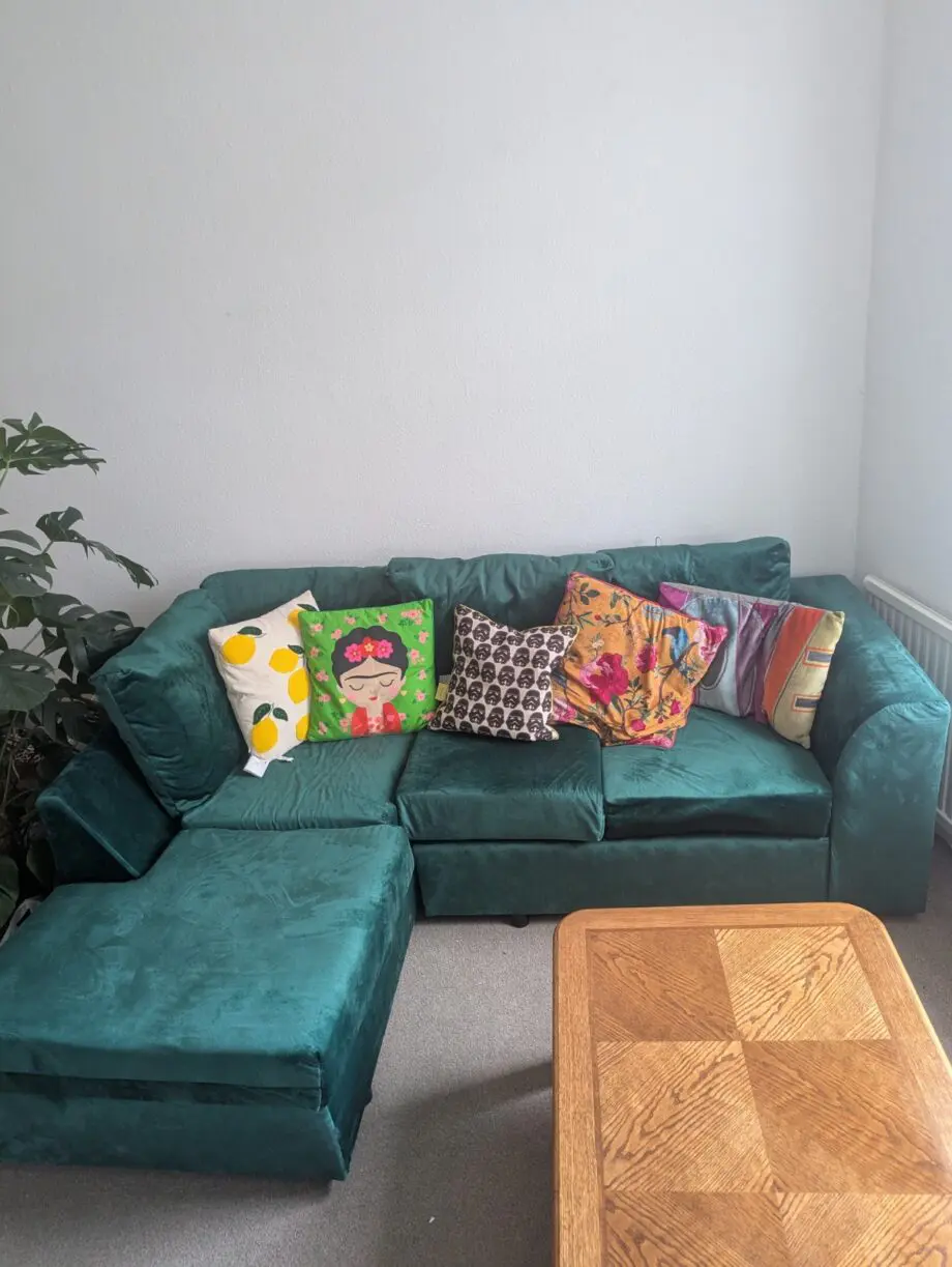 Brand new emerald green velvet L-shaped sofa (Left as facing)