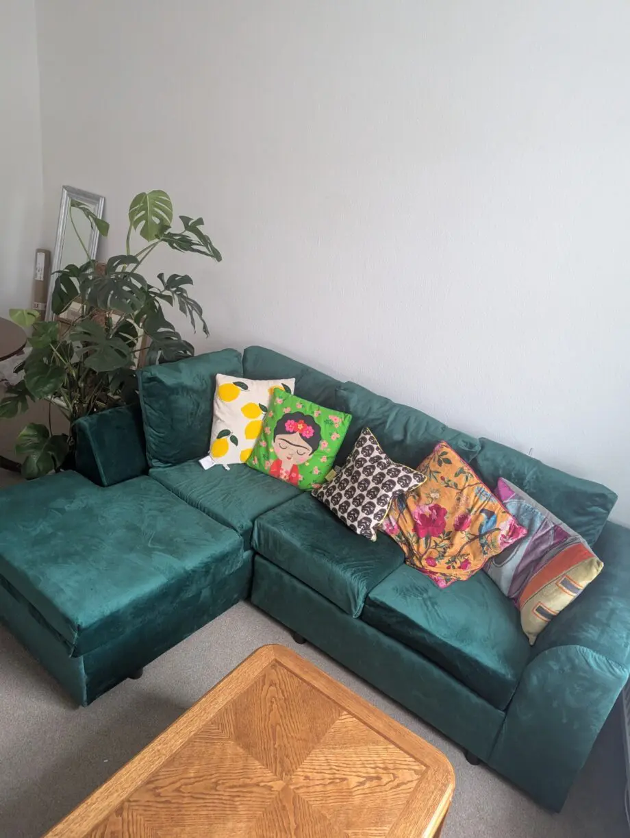 Brand new emerald green velvet L-shaped sofa (Left as facing)