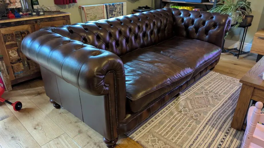 Distinctive Chesterfield brown leather sofa