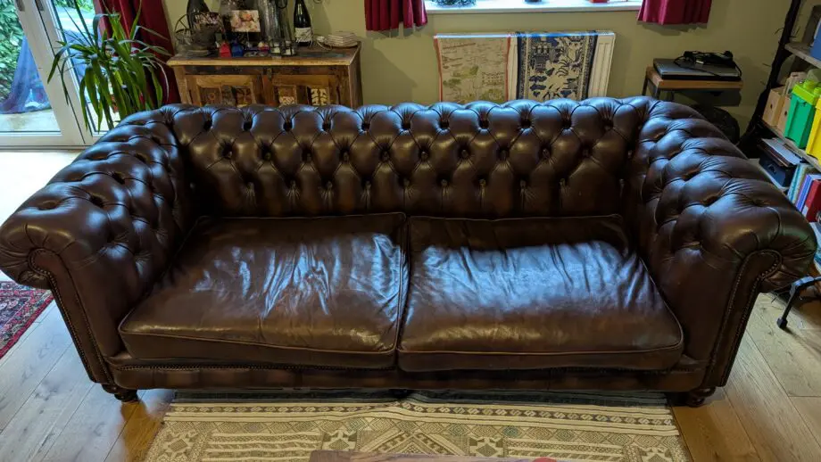 Distinctive Chesterfield brown leather sofa