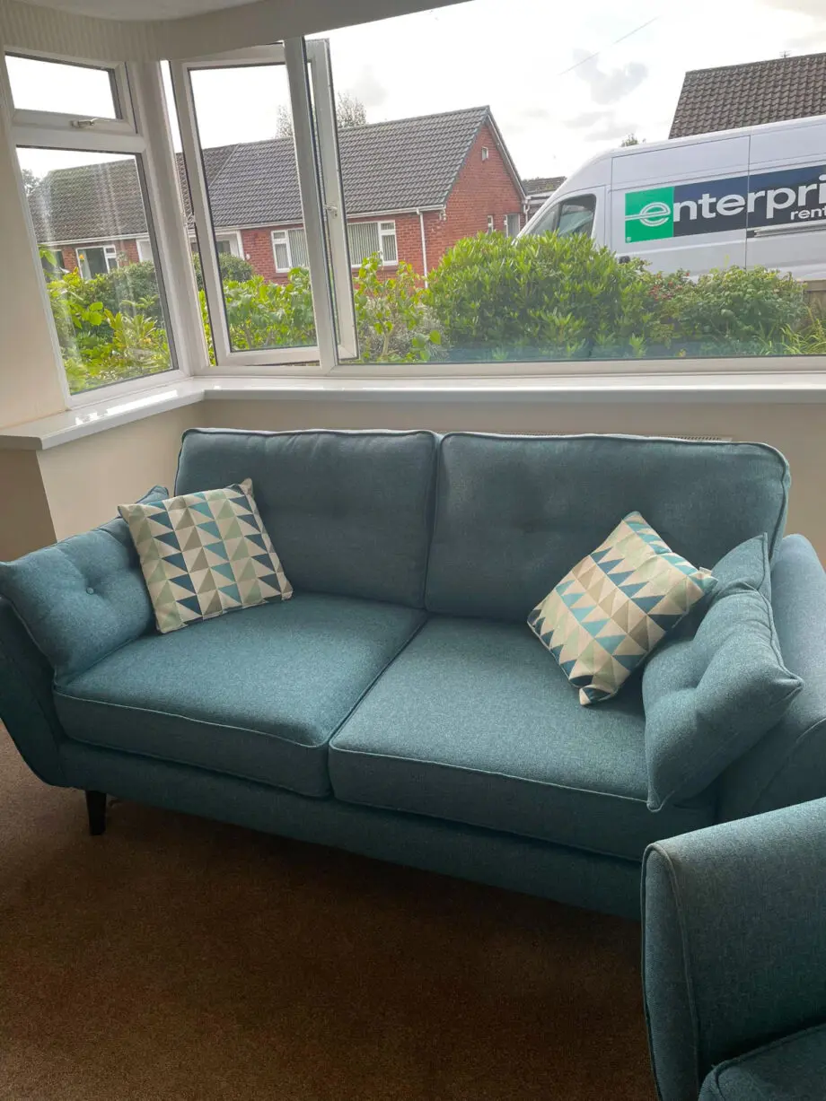 DFS French Connection Zinc three-seat sofa and two chairs in teal, and scatter cushions