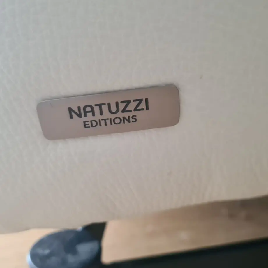 Natuzzi Editions white reclining sofa