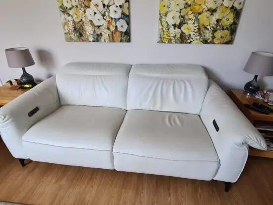 Natuzzi Editions white reclining sofa