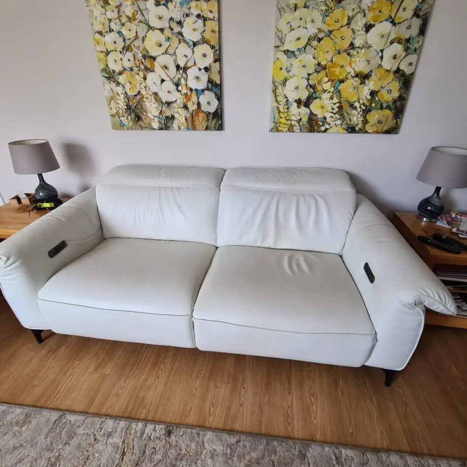 Natuzzi Editions white reclining sofa