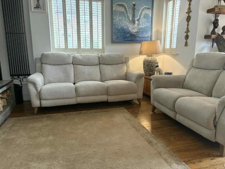 FAB Furniture beige/light peach/ oatmeal .Fabric 3 and 2 seater reclining settee’s with usb ports(sofa set)