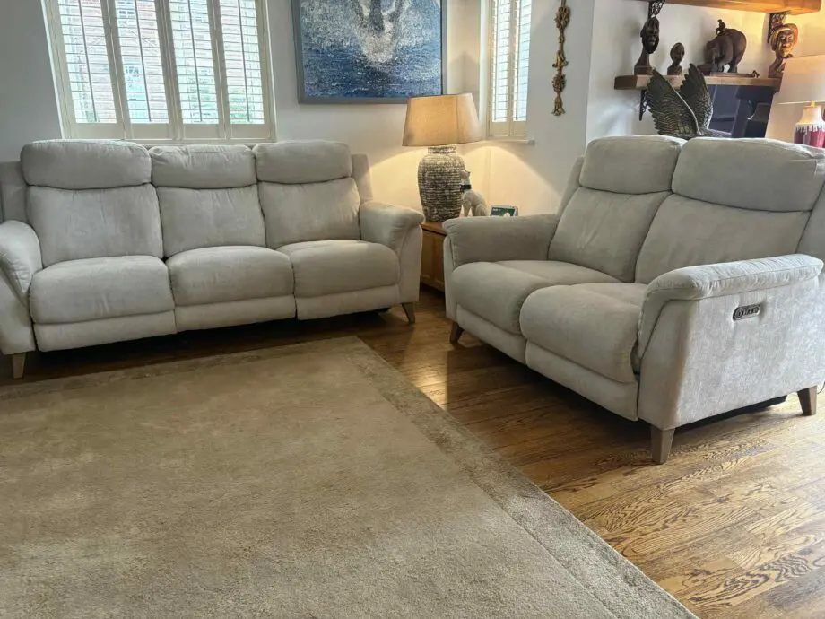 FAB Furniture beige/light peach/ oatmeal .Fabric 3 and 2 seater reclining settee’s with usb ports(sofa set)