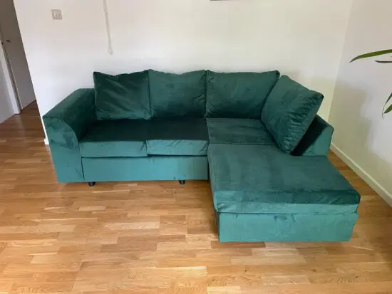 Brand new emerald green velvet L-shaped sofa (right)