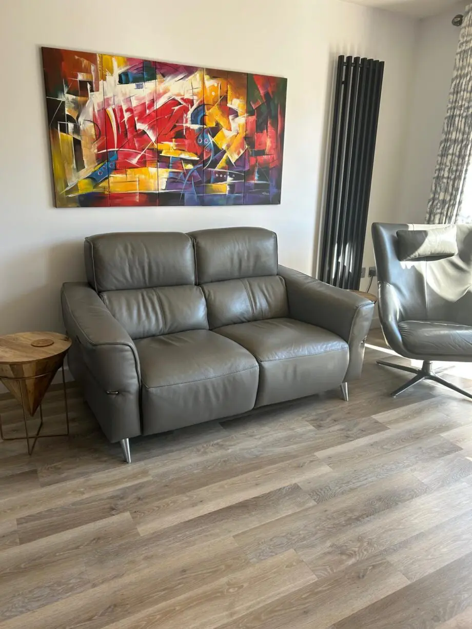Leather 2 seater electric reclining sofa