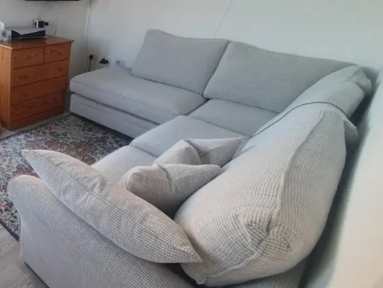 Eve right-hand facing corner sofa in Padstow Sand fabric, handmade by Lucas Furniture.