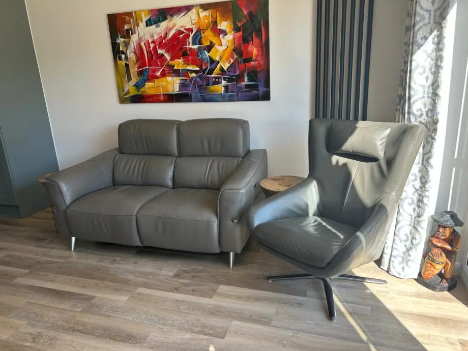 Leather 2 seater electric reclining sofa