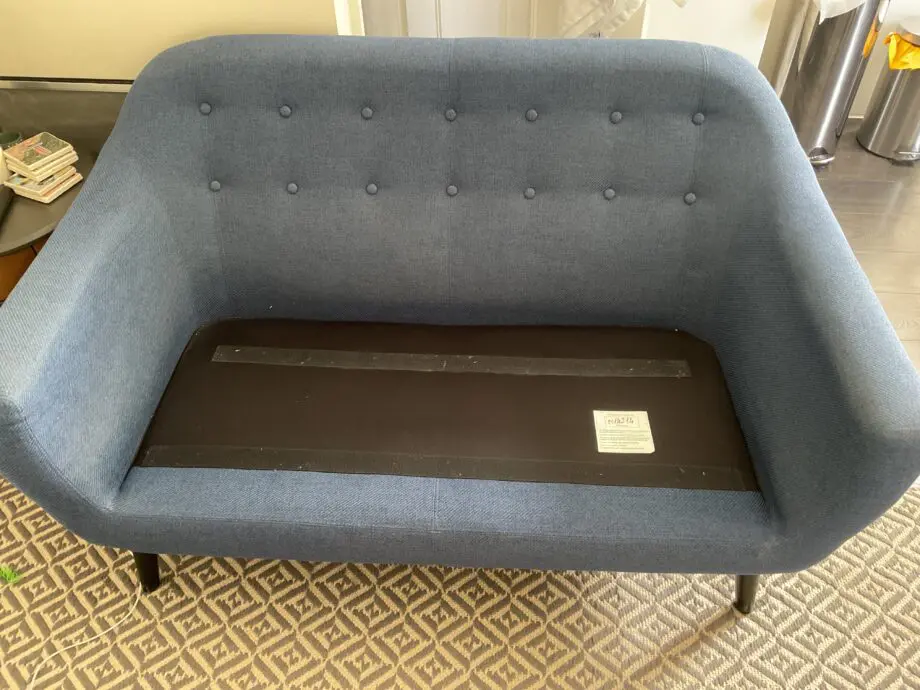 Made Dark Blue 2 seater sofa with black legs