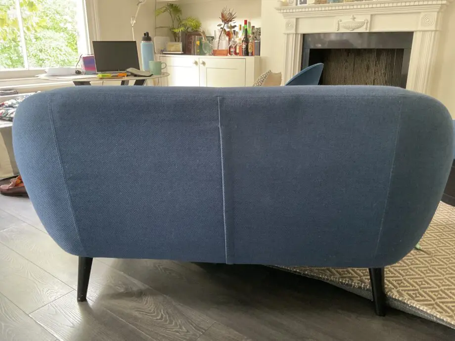 Made Dark Blue 2 seater sofa with black legs