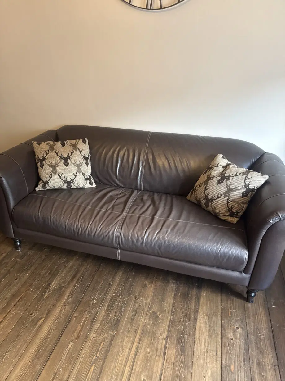 DFS 3 and 2 seater sofas. 3 seater Brown leather and 2 seater patchwork. Coordinated pieces