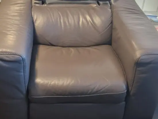 Natzzui power recliner chair. In stone leather