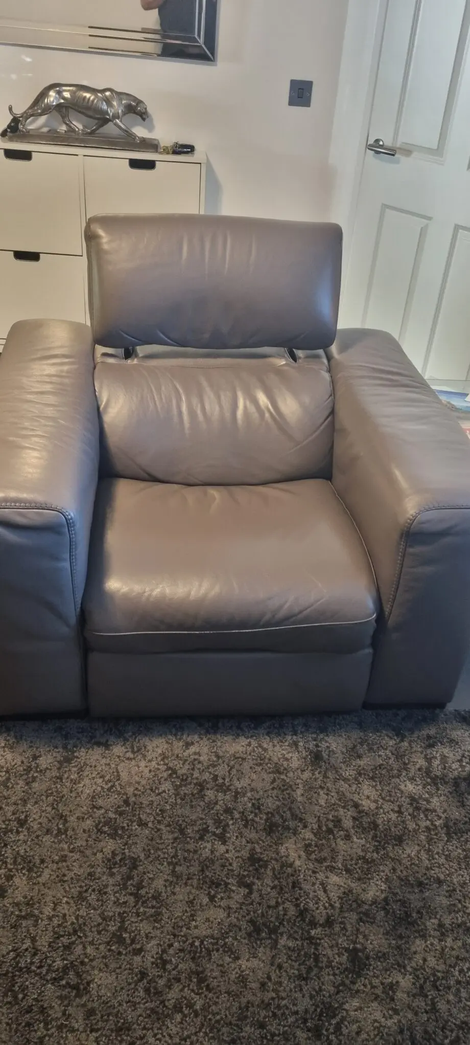 Natzzui power recliner chair. In stone leather