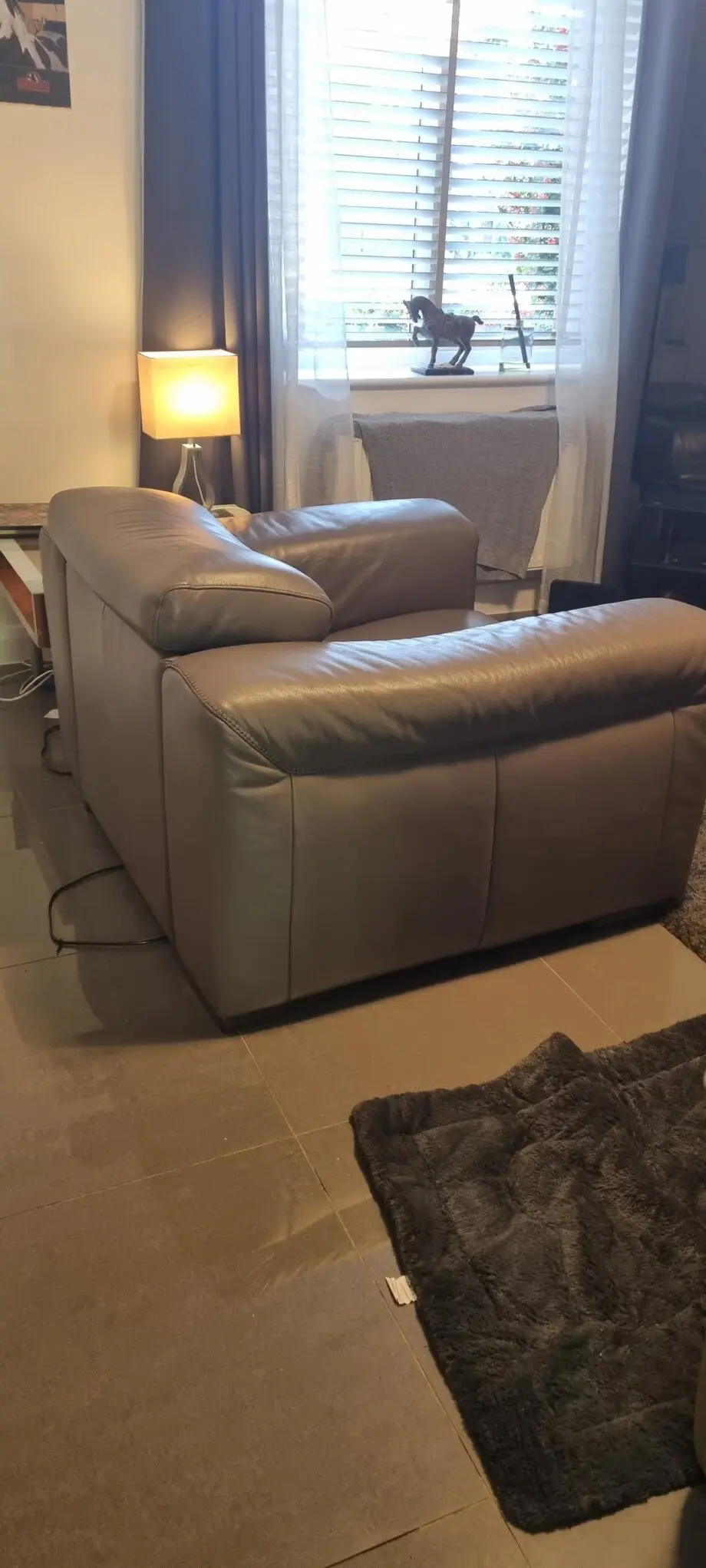 Natzzui power recliner chair. In stone leather