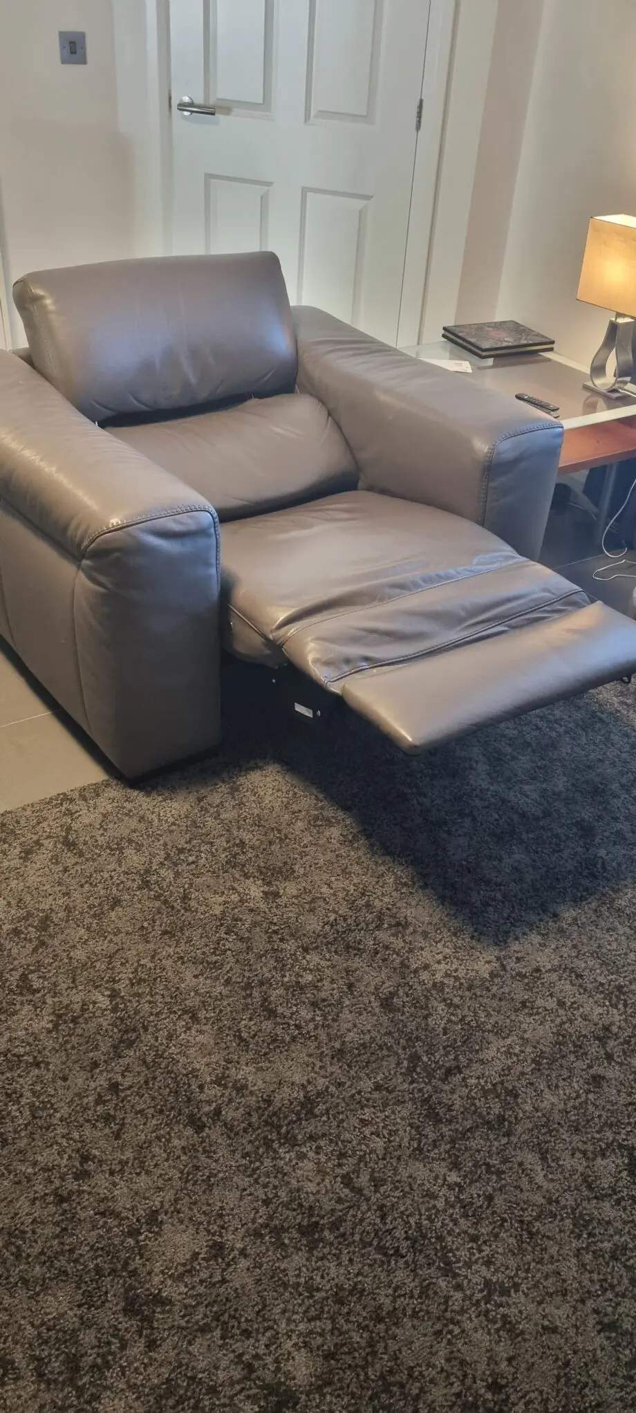 Natzzui power recliner chair. In stone leather