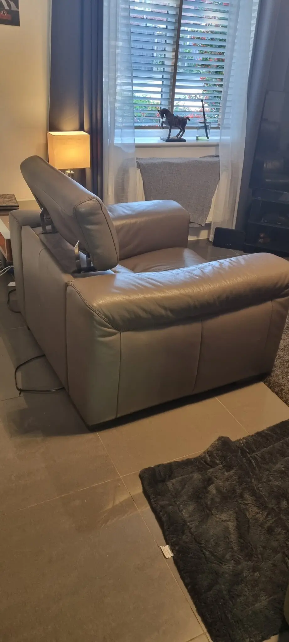 Natzzui power recliner chair. In stone leather