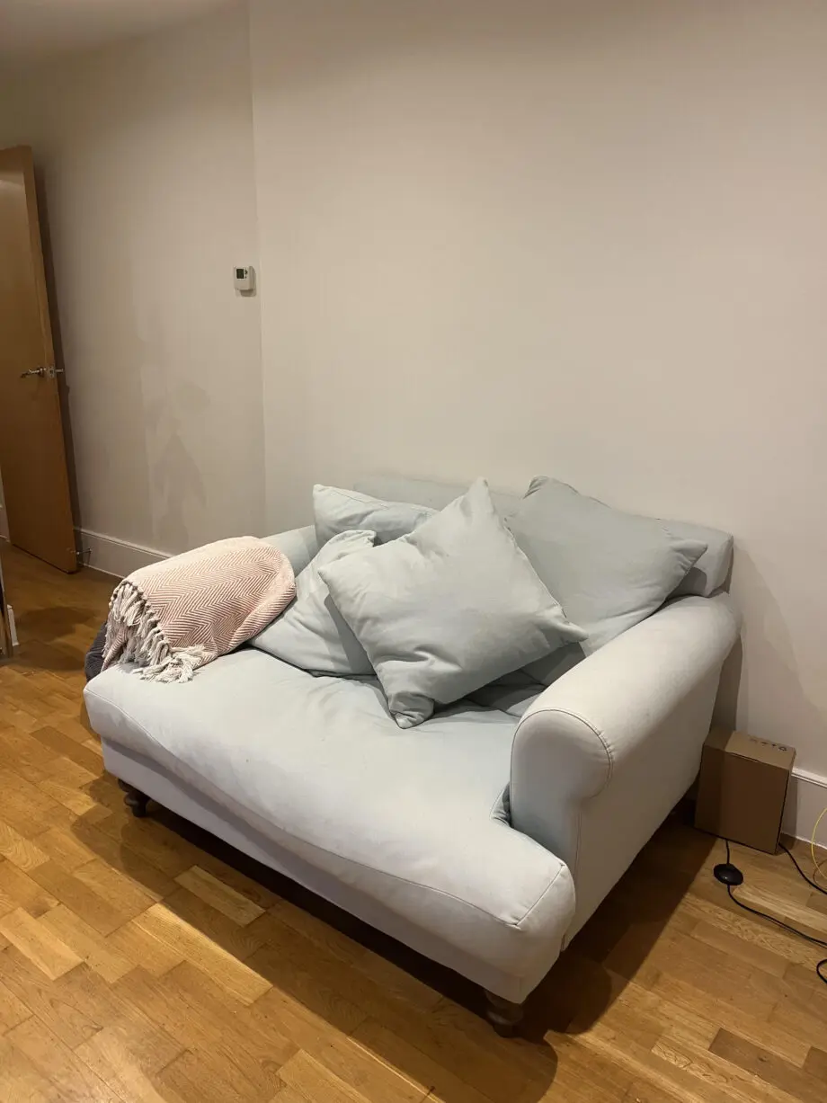 Light blue comfy loveseat sofa