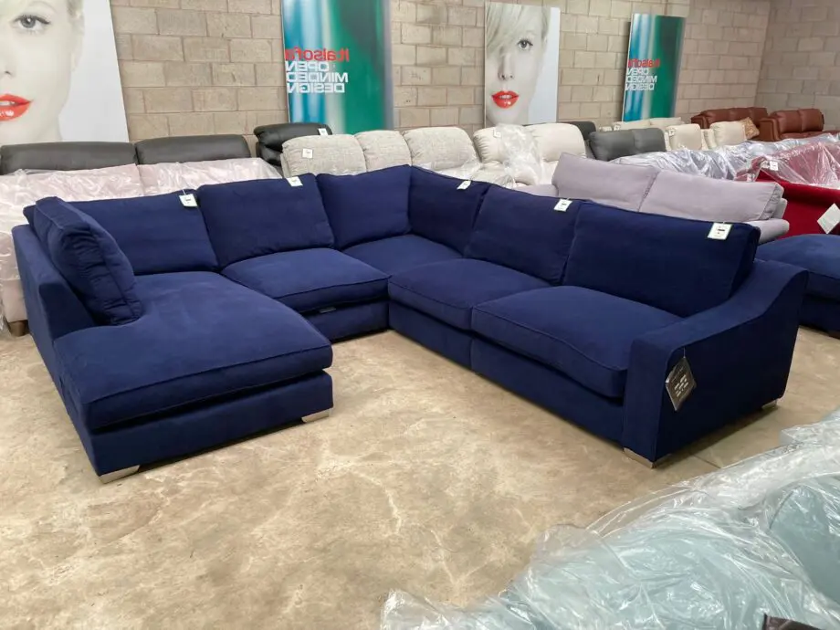 The Lounge Co “Imogen” Corner Sofa with Chaise & Matching Footstool – Damson Jam