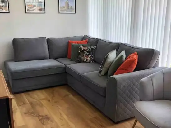Dfs Orka Range Upholstered in a Dark Grey Fabric Sofa For Sale